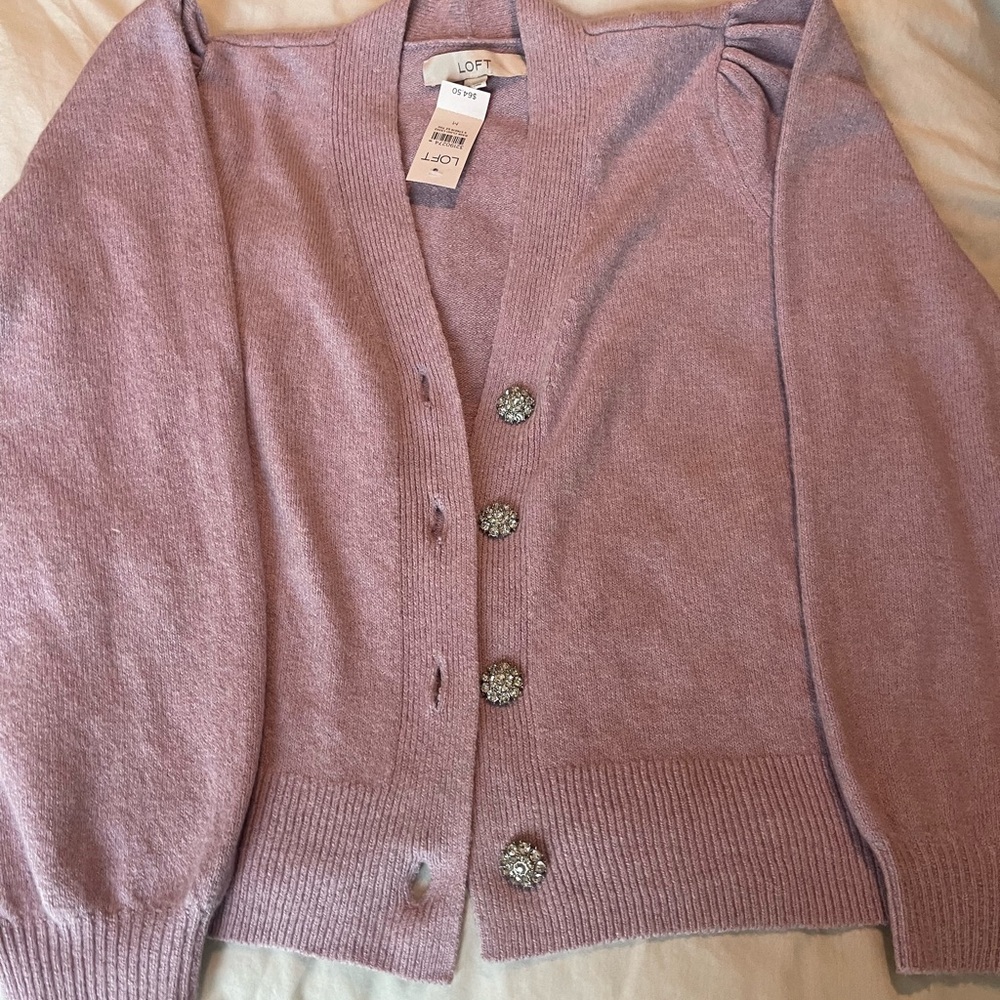 New pink sweater size medium